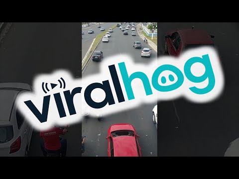Good Samaritan Helps Push Stalled Car Off Highway || ViralHog