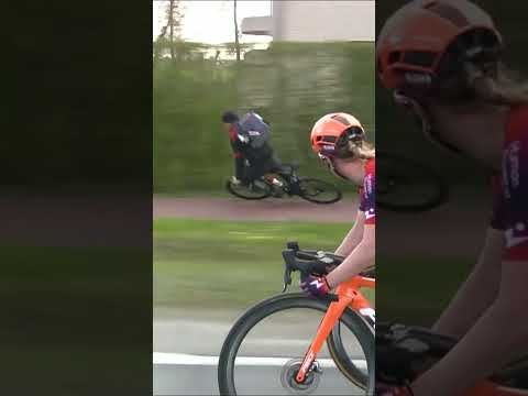 Spectator Crashes While Riding Alongside Peloton! #shorts