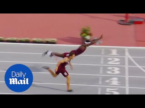 Hurdler Infinite Tucker dives over finishing line to win race